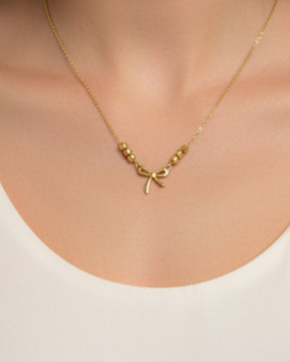 Golden Knot Charm Necklace