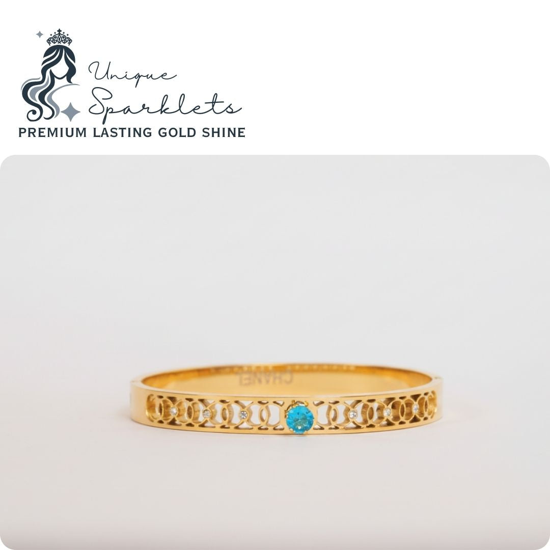 Interlocking Loop & Blue Topaz Cuff