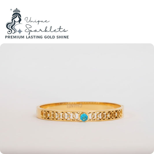 Interlocking Loop & Blue Topaz Cuff