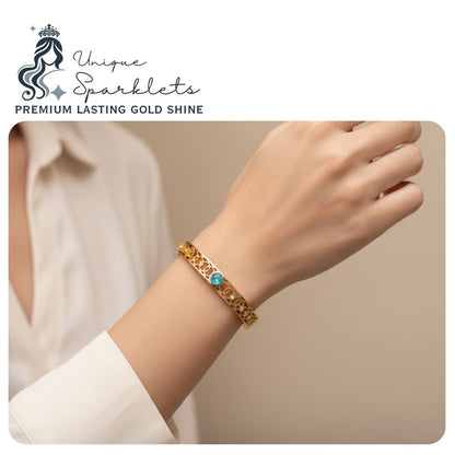 Interlocking Loop & Blue Topaz Cuff